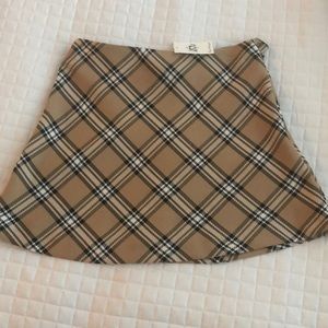 Plaid mini skirt. Brand new.